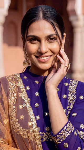 Purple hand embroidered gharara suit