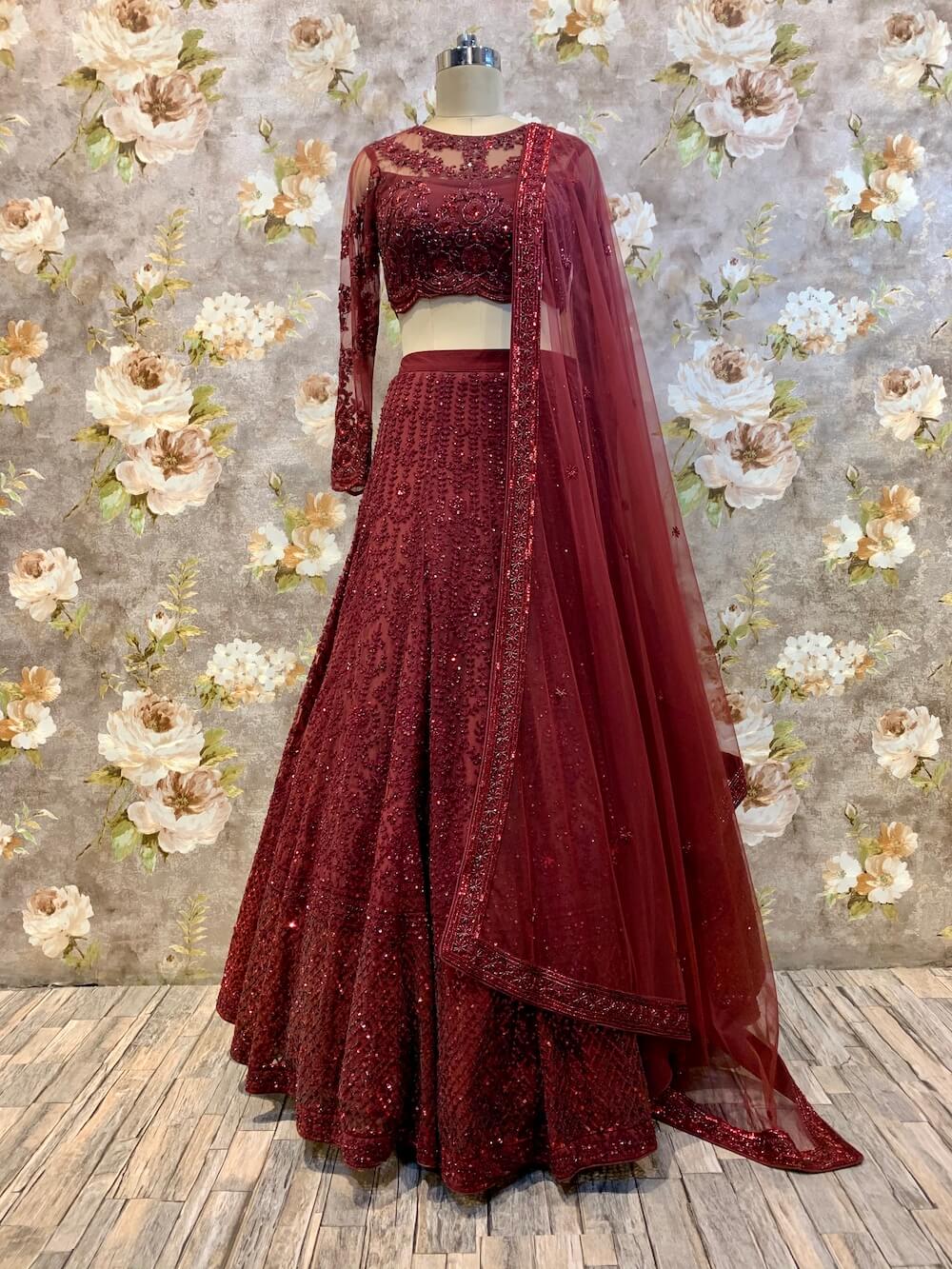 An absolutely charming maroon and cream net lehenga with a beautiful  maximum flare! The maroon blouse has unique and intricate details and… |  Instagram